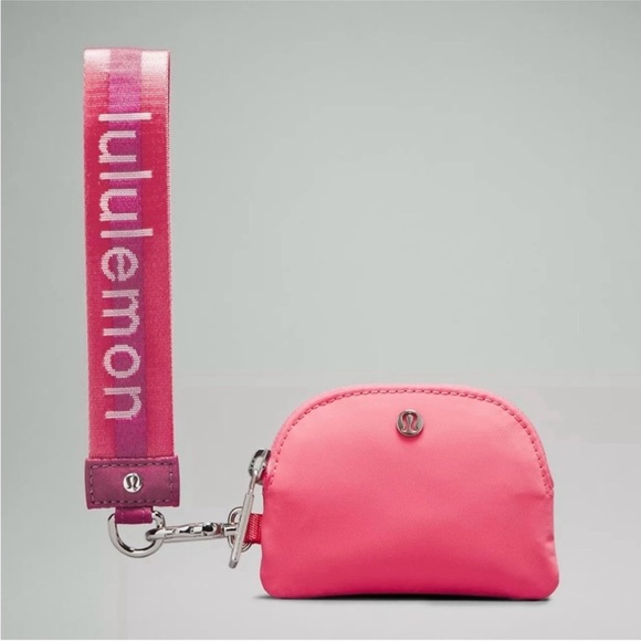 LULULEMON DUAL POUCH WRISTLET IN *wordmark* WASHED MAUVE/SAKURA PINK COMBO - Picture 2 of 8